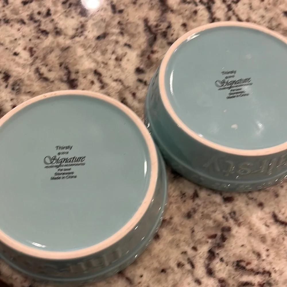Two stoneware Pet bowls